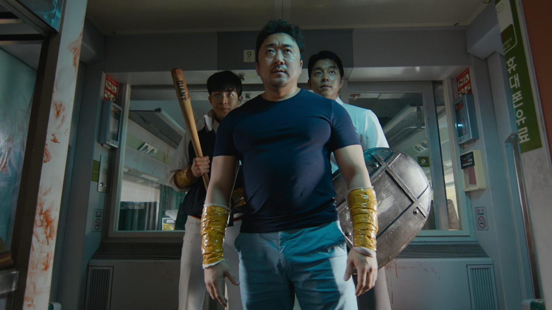 3 personnages prêts pour la bagarre dans Dernier Train pour Busan